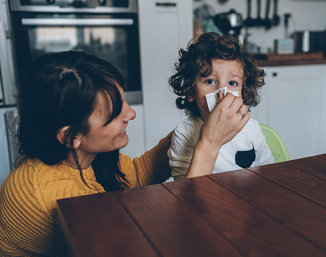 Child and mom stopping bloody nose